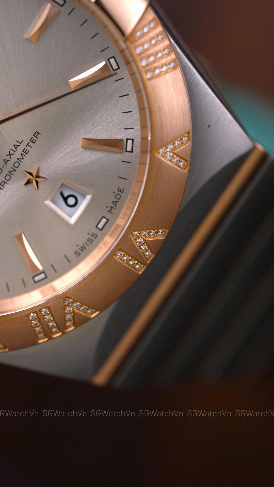 Omega Constellation Co-Axial Day-Date 123.25.38.22.02.001 – 38mm Demi Vàng Hồng 18K, Bezel Kim Cương