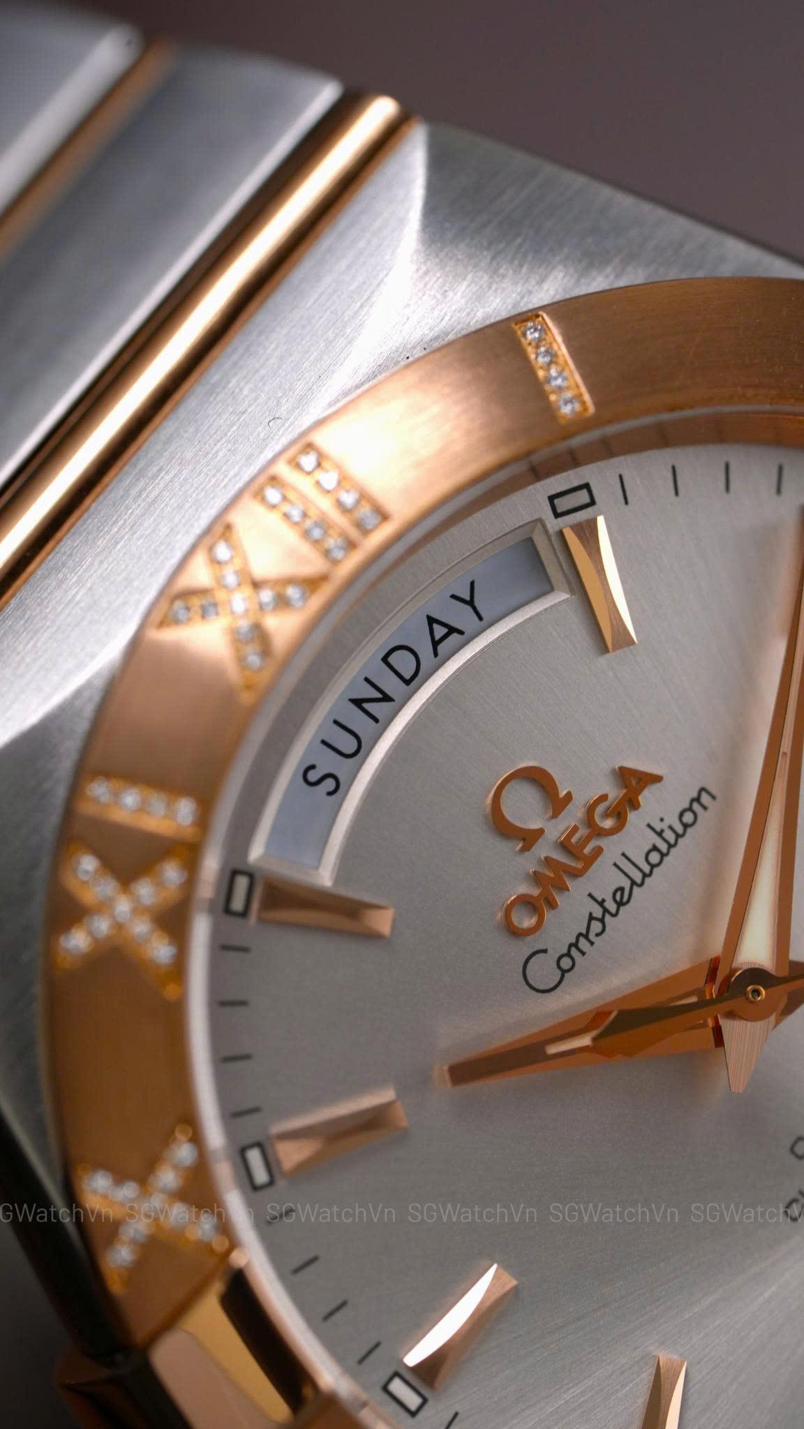 Omega Constellation Co-Axial Day-Date 123.25.38.22.02.001 – 38mm Demi Vàng Hồng 18K, Bezel Kim Cương